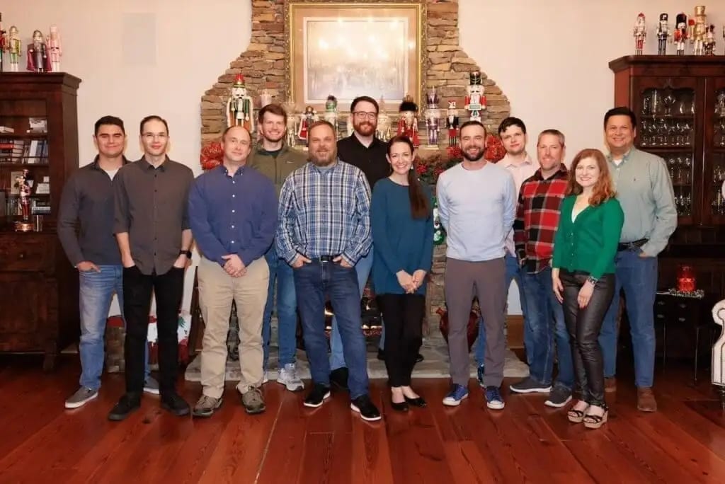 Raxis team members together at a holiday gathering