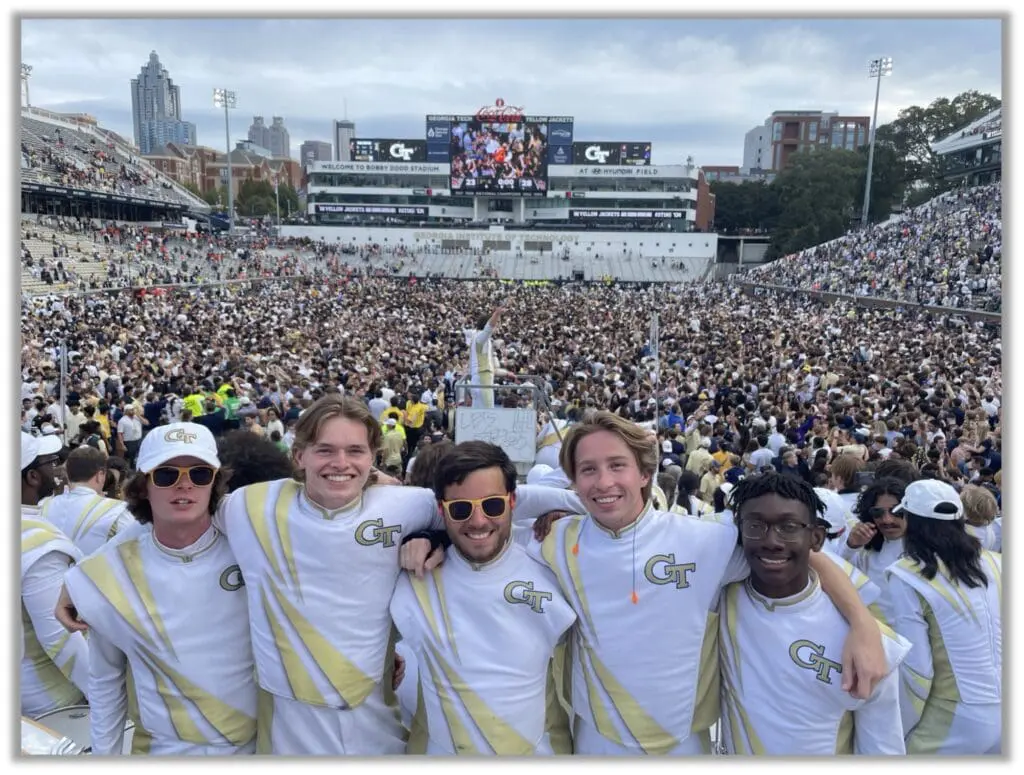 Chris with the Georgia Tech band celebrating Georgia Tech's upset of #4 ranked Miami
