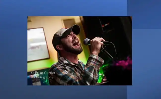 Tim singing karoke