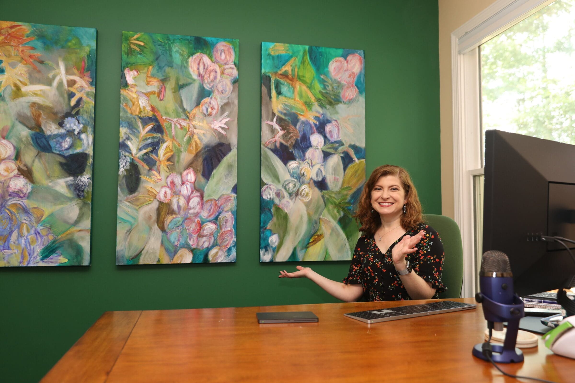 Raxis COO Bonnie Smyre with her new art by Kasi Reilly