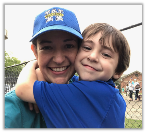 Caroline and son at a ball game