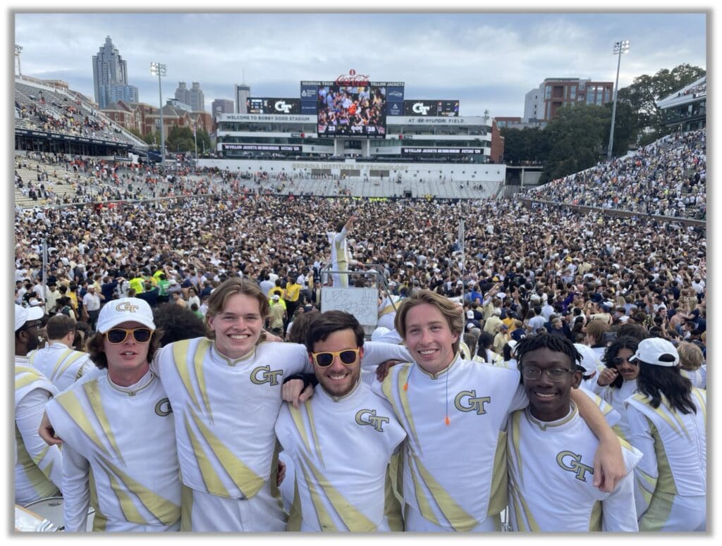 Chris with the Georgia Tech band celebrating Georgia Tech's upset of #4 ranked Miami