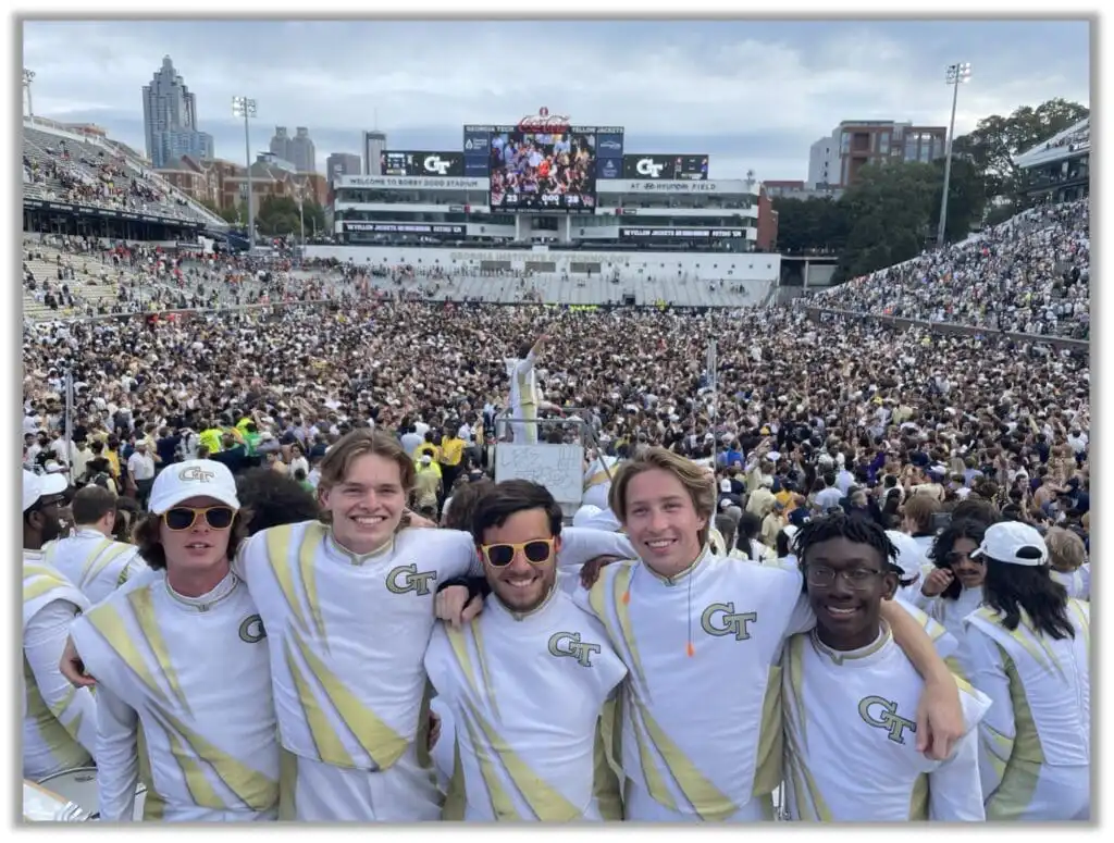 Chris with the Georgia Tech band celebrating Georgia Tech's upset of #4 ranked Miami